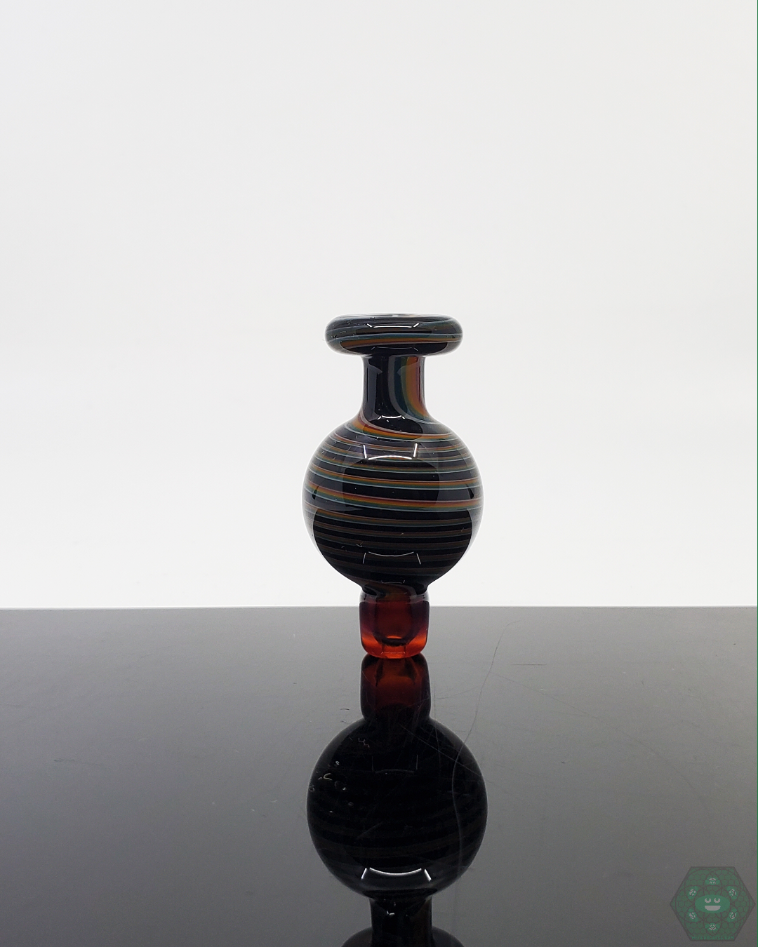 217 Glass WigWag Bubble Cap for Quartz Bangers. Enhance your dabbing experience with this visually appealing, high-quality glass bubble cap. Helps control airflow for even vapor and enhanced flavor. Durable and easy to handle.