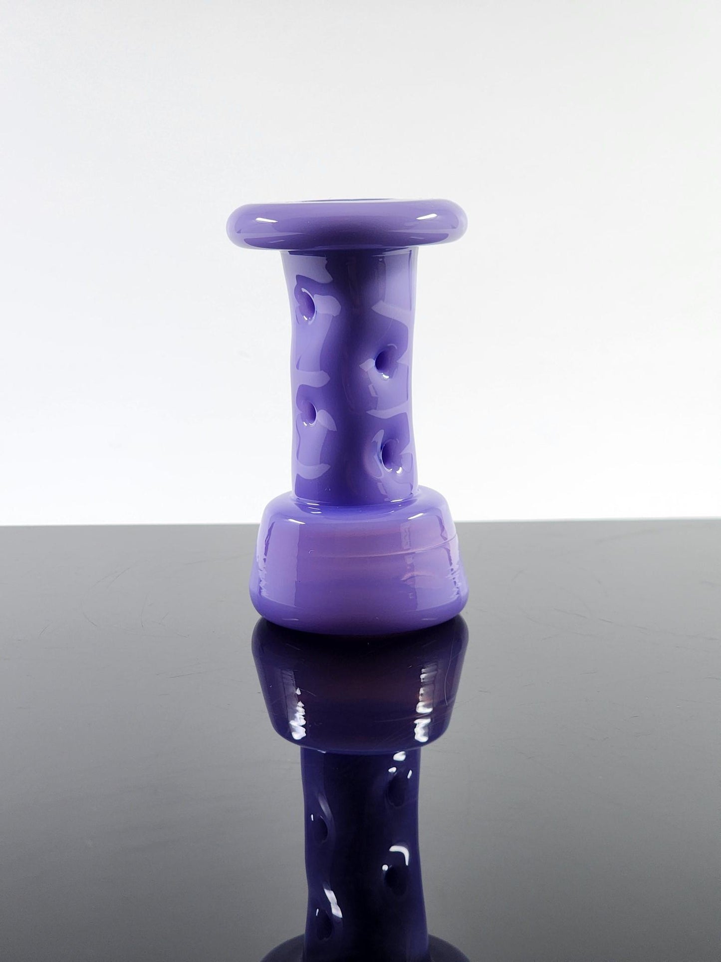 Durin Glass Cooling Tower Puffco Attachment in a lifestyle setting, adding style and efficiency to dabbing sessions.