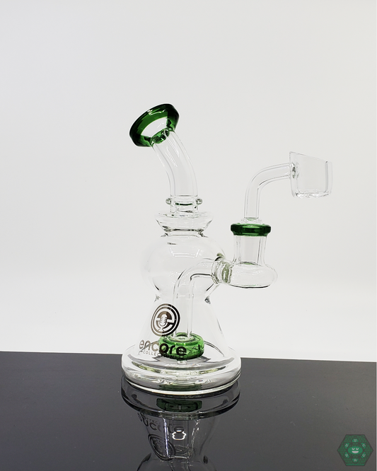 Encore Glass 6-inch Showerhead Rig featuring 8-hole perc and quartz nail, delivering smooth hits with a 14mm female joint in Blue, Green, and Teal options