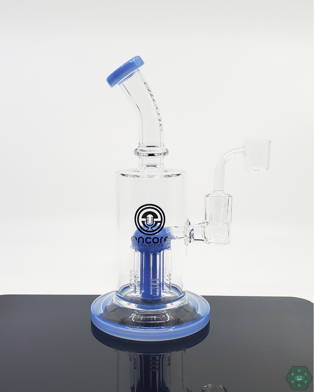 Encore Glass 8” Tree Perc Rig in teal, featuring an 18-hole, 6-arm tree perc for smooth filtration and cool hits.
