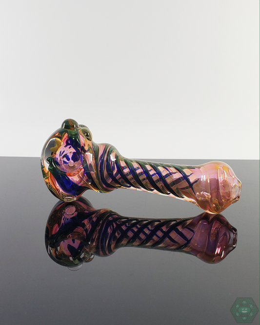 Side view of the LQL Glass Triple Tornado Spoon, showcasing its artistic glasswork and ergonomic design.