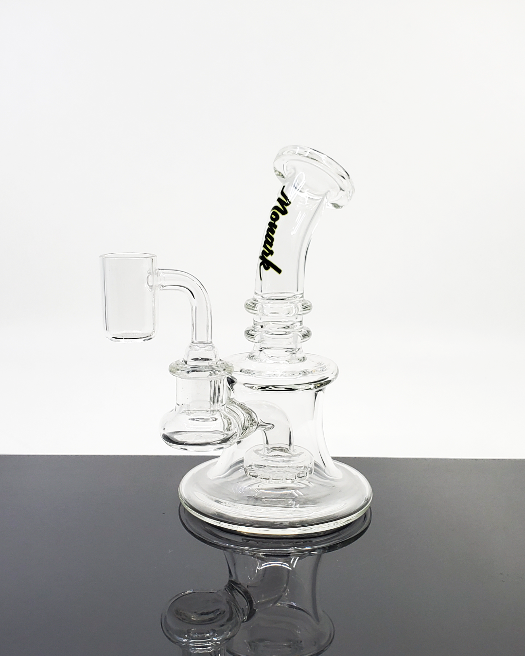 Side view of the Monark Glass 6” Bell Banger Hanger, showcasing its durable design and compact size for smooth hits.