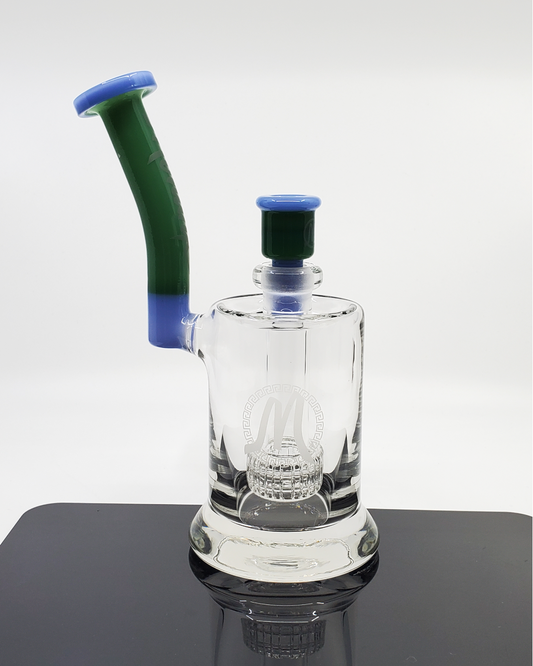 Close-up of Monark Glass 75MM Super Matrix Bub highlighting its durable construction and precision-crafted percs.