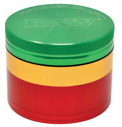 Side view of the RAW x Hammercraft 4 Piece 2.5" Grinder, showcasing its sleek design and efficient grinding mechanism.