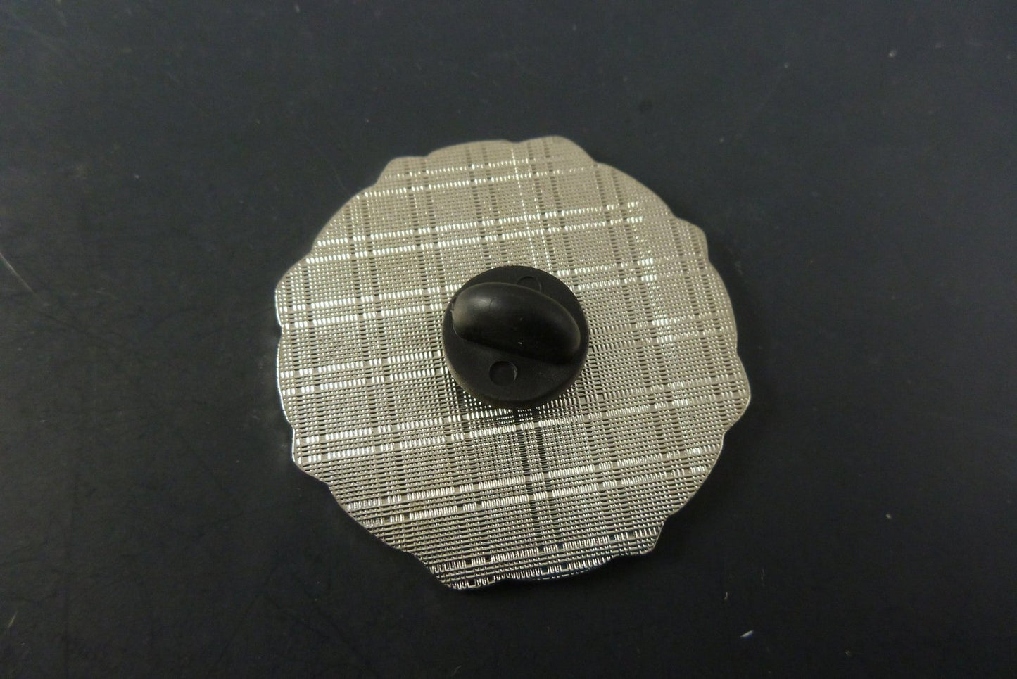 Close-up of the Geometric Hat Pin, showcasing its intricate design and vibrant colors, ideal for modern art enthusiasts and accessory collectors.