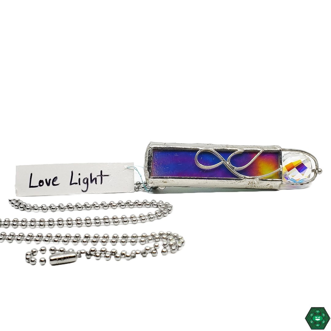 Katie Did It Jewelry: These pendants are a beautiful example of Katie Did It's unique and artistic approach to glass jewelry design.