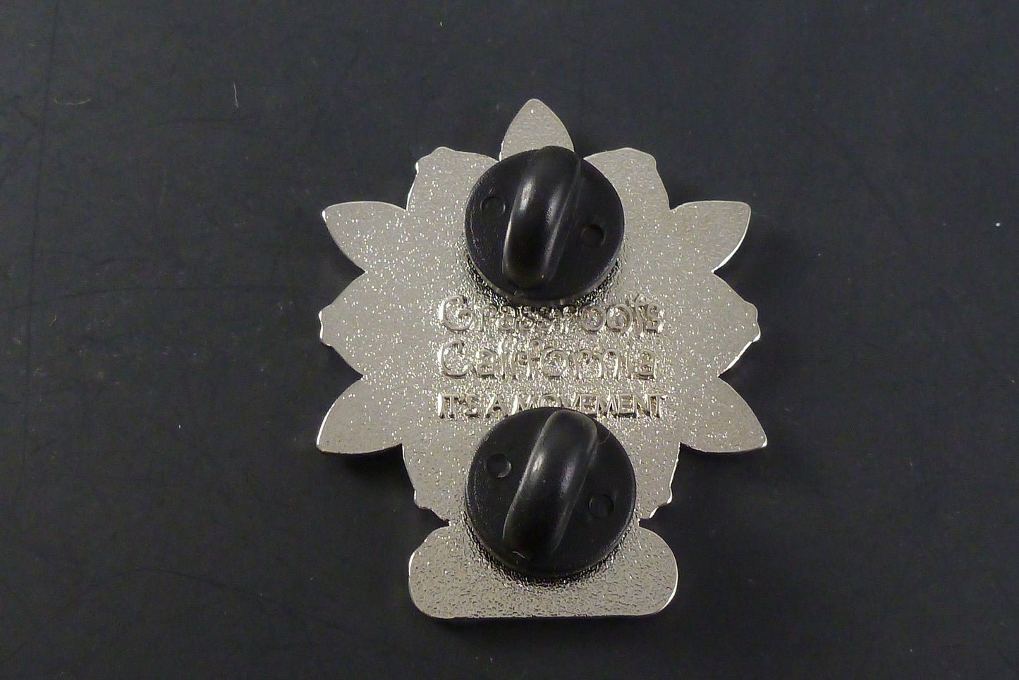 Close-up of the Silver Flower Hat Pin, showcasing its intricate flower design and high-quality finish, ideal for collectors and those who appreciate elegant accessories.