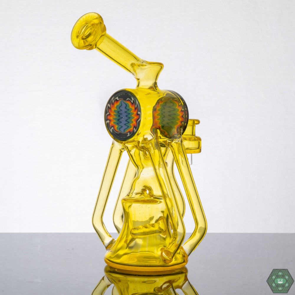 Enjoy a smooth and flavorful dabbing experience with the Tainted Glass Terps Recycler.
