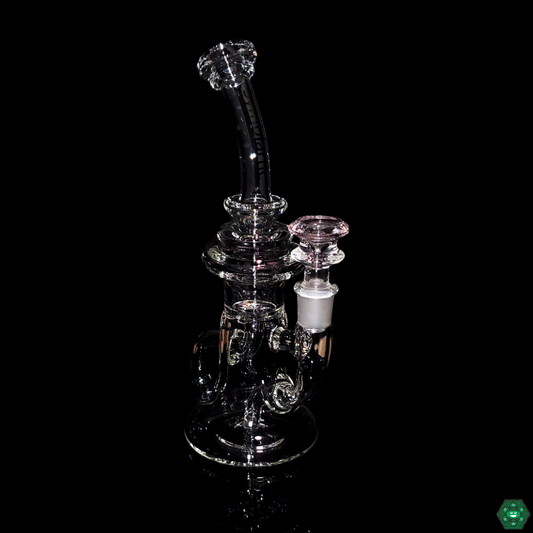 Symbiartic Glass 8" Klein in use, demonstrating its efficient 6-hole perc filtration system for smooth, powerful hits during a dabbing session.