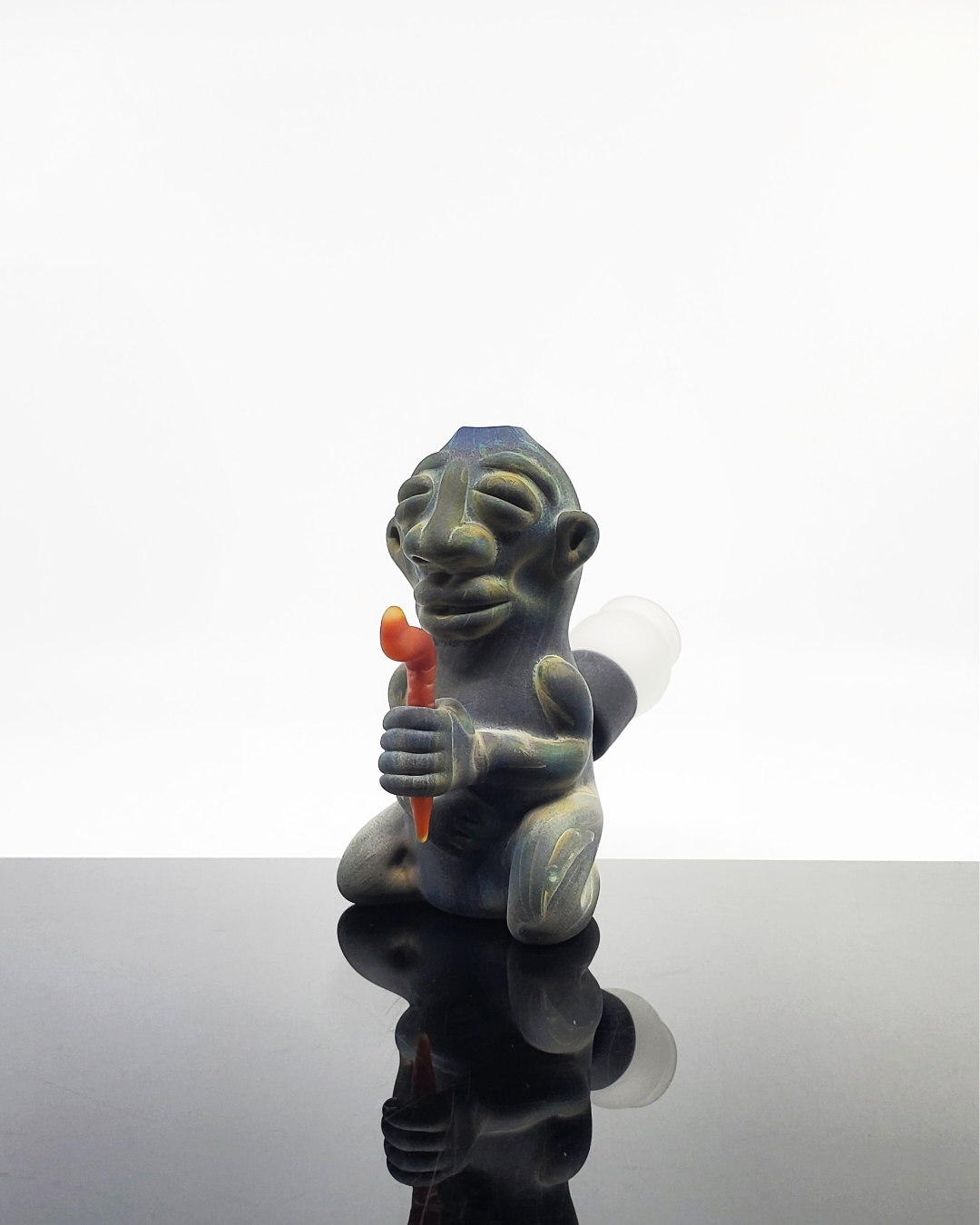 Side view of the Creep Meditating Minitube, showcasing its intricate craftsmanship and high-quality glass construction.