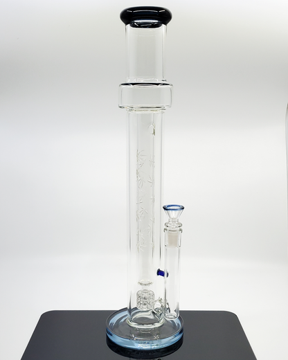 Side view of the DHK Glass 17” Pot Leaf Straight Tube showcasing its decorative pot leaf design and functional filtration for an enhanced smoking experience.