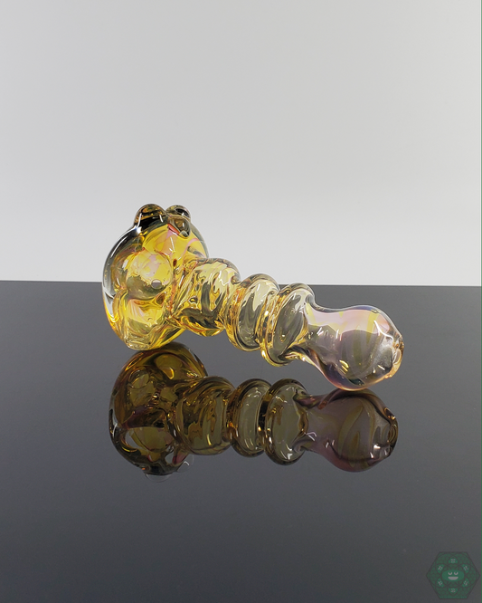 Side view of the LQL Glass Fumed Spoon, showcasing its handcrafted design and ergonomic shape.