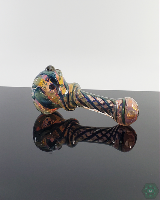  LQL Glass Triple Tornado Spoon featuring intricate fumed glass with swirling patterns and a color-shifting effect.