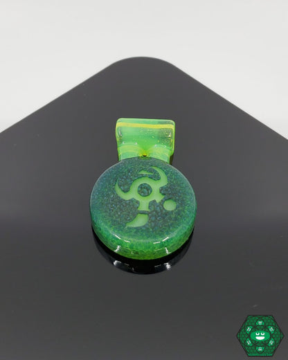 IO Glass Pendant, a handcrafted artistic jewelry piece by IOglass featuring intricate details and a unique glass design.