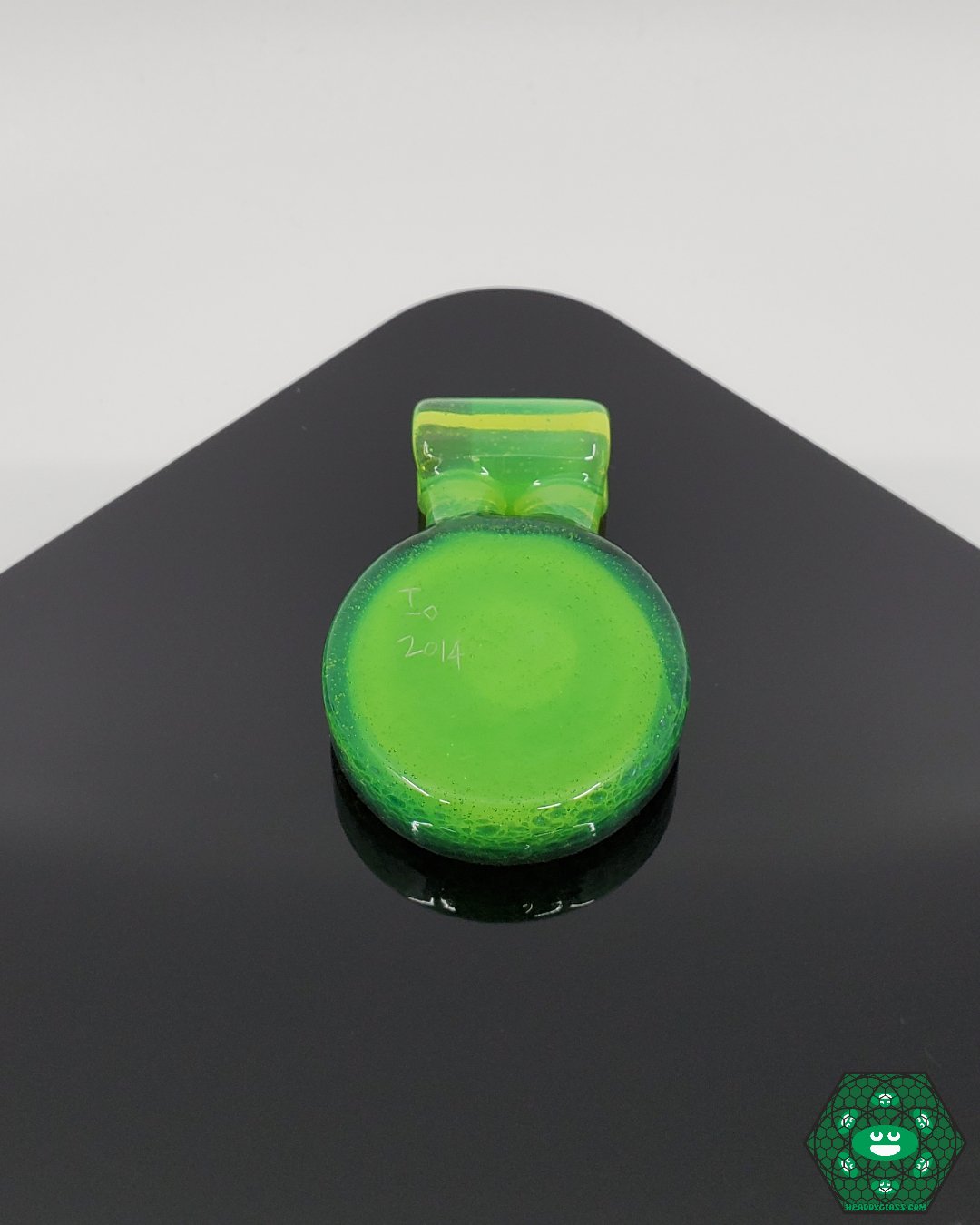 IO Glass Pendant, a lightweight and elegant handcrafted glass art piece, perfect for collectors and wearable art enthusiasts.