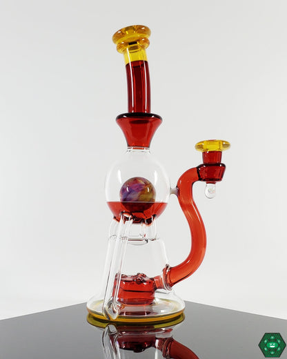 OM Glass Co Vasuki Recycler Details: Close-up showcasing the triple uptake and 3-hole perc of this innovative recycler, highlighting its function-driven design and detailed craftsmanship for smooth, filtered hits.
