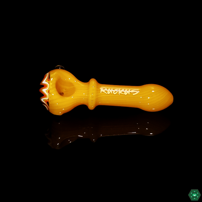 Ruckus Glass Wigwag Spoon in hand, demonstrating its ergonomic design and comfortable grip for smooth, enjoyable use.