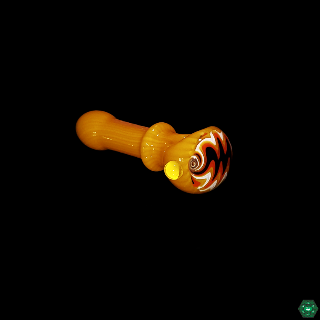  Ruckus Glass Wigwag Spoon in use, showcasing the smooth and efficient smoke flow through the intricate wigwag design.